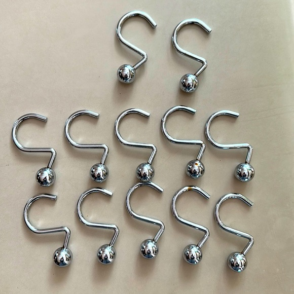 12 gently used shower curtain hooks in shiny chrome finish - Picture 1 of 3